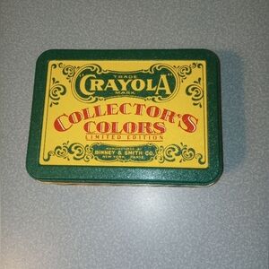 Crayola Collectors colors tin with crayons. Includes the collectors colors box!